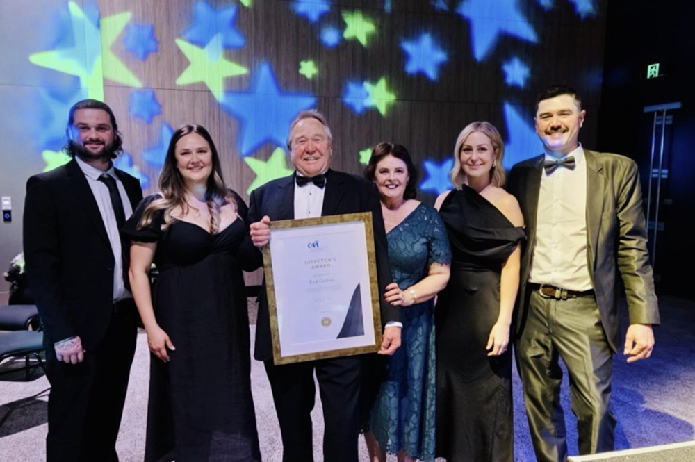 Rick Graham and his family celebrate his Award.