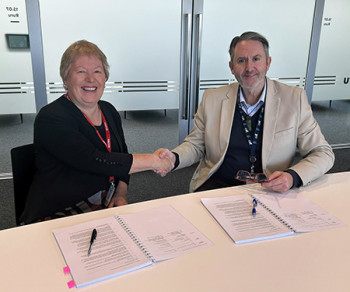 Denise Church, Airways Board Chair, and Mark Darrow, Civil Aviation Authority Board Chair, sign the contract.