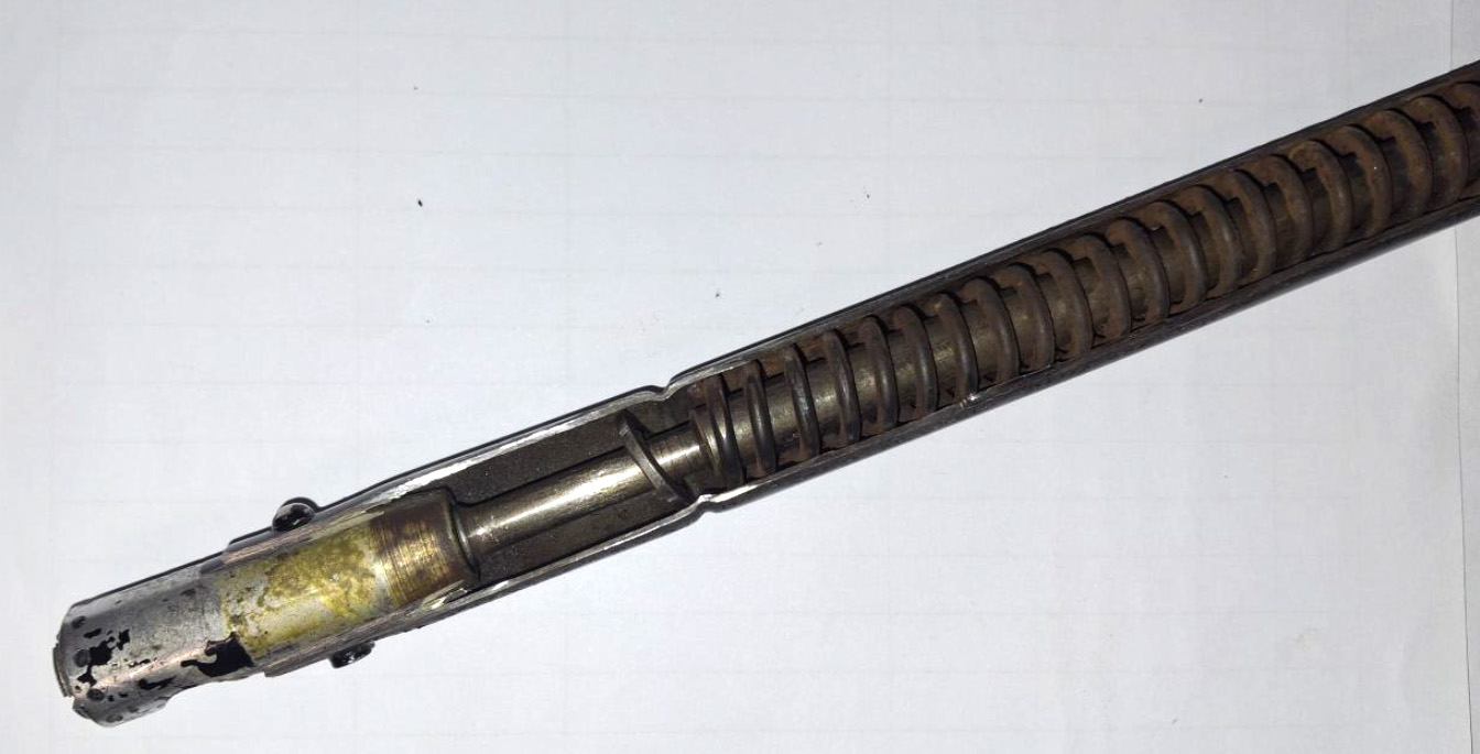 Figure 2 – Failed condition - Washer forced beyond the crimped section of the tube