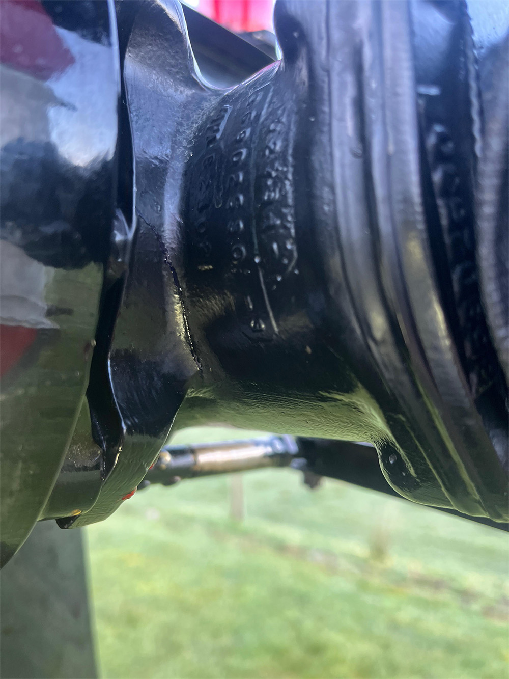Figure 1 – Tail Rotor Gearbox crack found during the pre-flight inspection. Note the presence of oil residue.