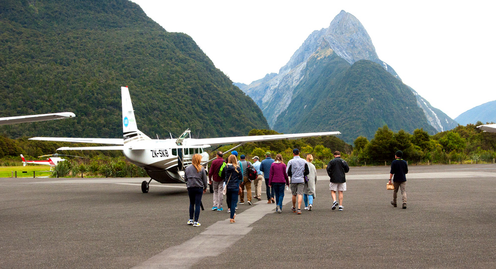 Small plane and people at Milford Aerodrome