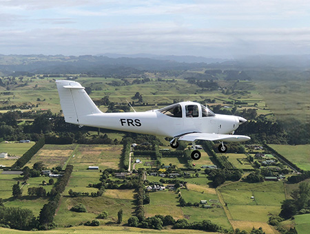 Small plane above Taranaki.