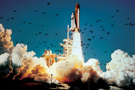 Challenger clears the tower at the Kennedy Space Center in Florida