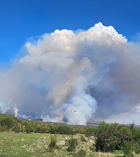 Helicopter putting out fires