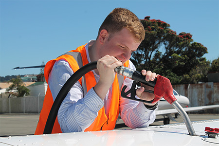 Man fuelling an aircraft