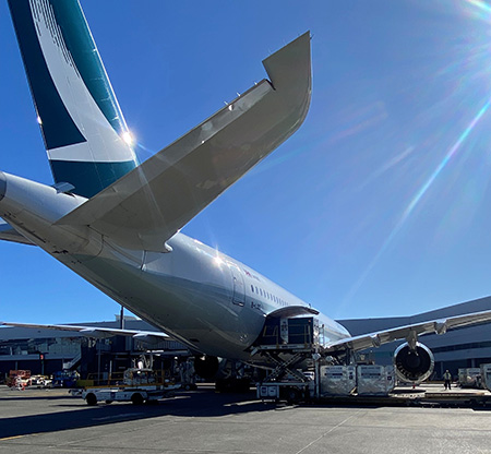 Plane with cargo being loaded