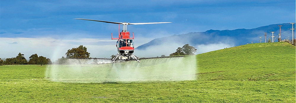 Agricultural helicopter in the field
