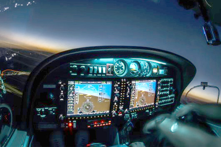 Cockpit at night with navigation highlighted