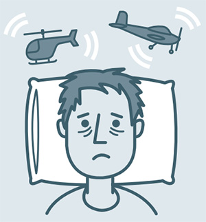 Cartoon of man bothered by aircraft noise